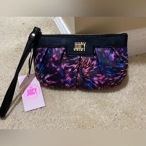 🆕🔥 juicy couture beautiful colors on this wristlet it’s a multicolor and nwt